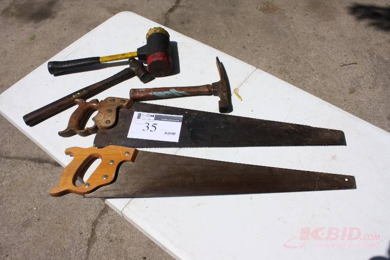 lot 35 image: Lot of (5) Hand Tools Including Hand Saws Hammers Pick Axe Hammer.