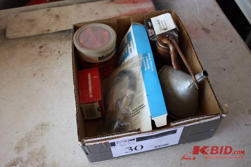 lot 30 image: Box Lot of (12) Including Gas Caps Hanger Funnel Tune-Up Kit And More.