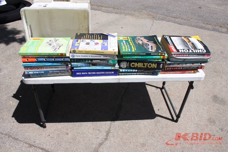 lot 43 image: Table Lot of Books Chilton Auto Manuals Napa Catlogs Mitchell Electrical Troubleshooting Program Does Not Include Table.