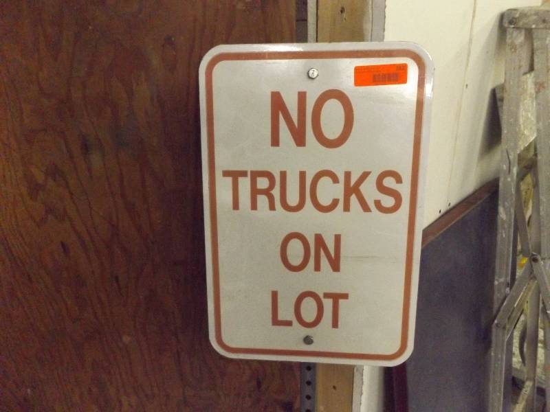 No Trucks On Lot Sign