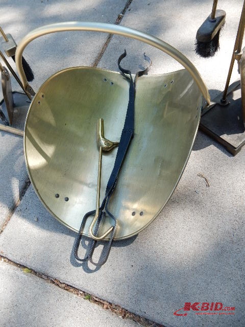 2 Fireplace tool sets and a wood rack..