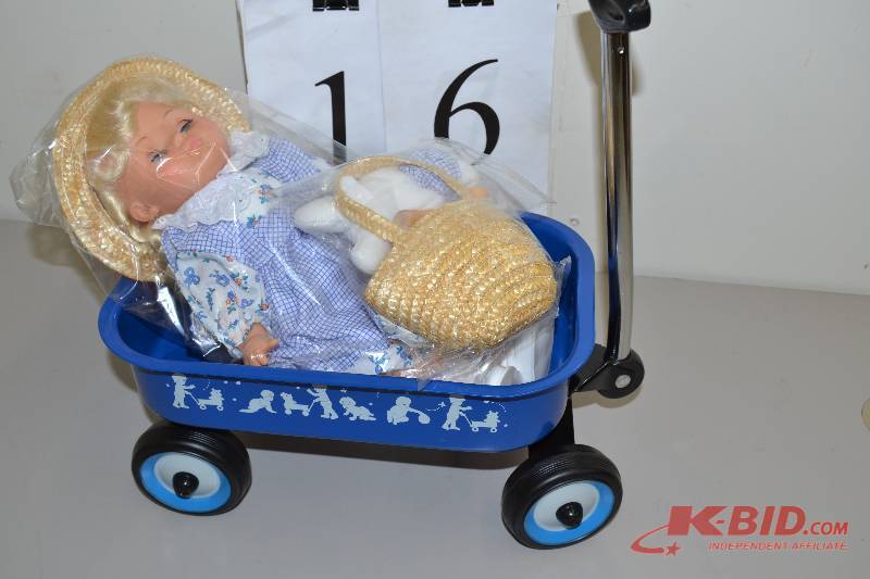 lot 16 image: NEW - Doll with wagon