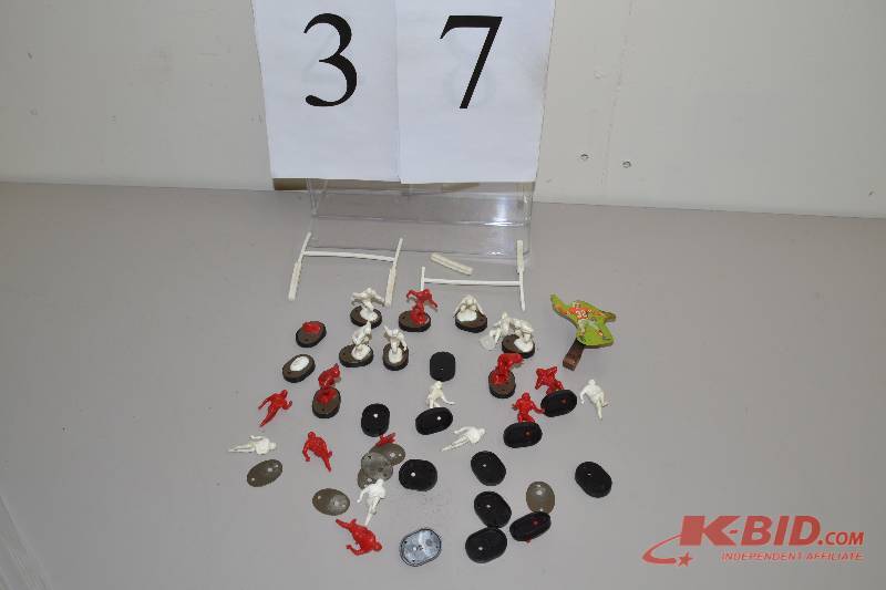 lot 37 image: Vintage plastic football game pieces