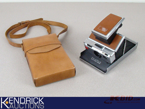 lot 36 image: Vintage Polaroid SX-70 Land Camera