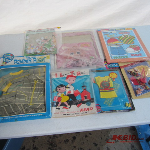 lot 286 image: Puzzles, Doll Clothes