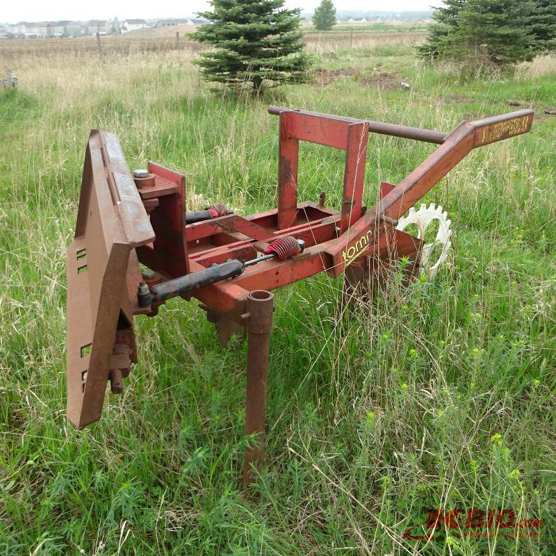 Tommy skidloader attachment for silt fence