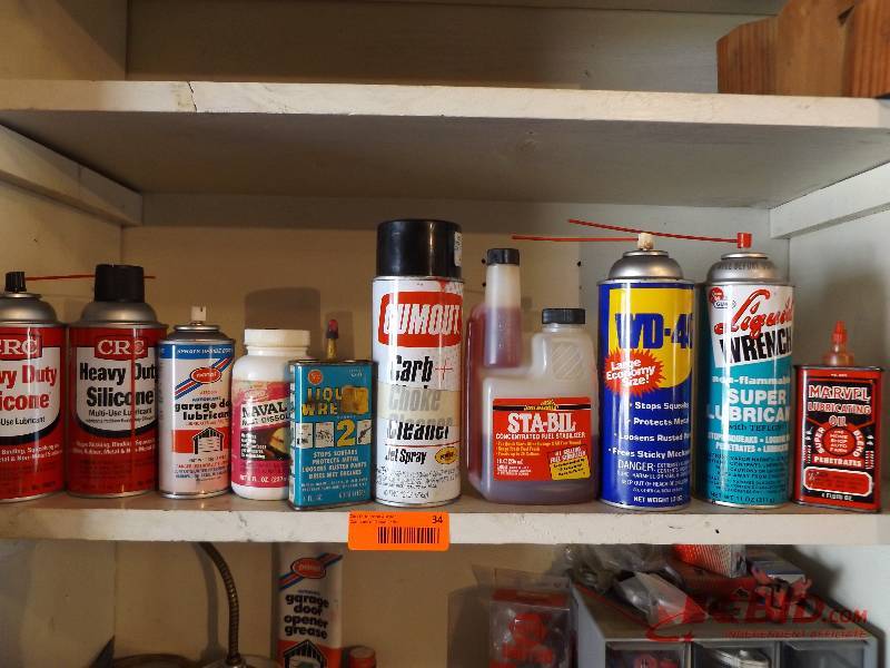 Assorted Mechanic Chemicals on Middle Shelf