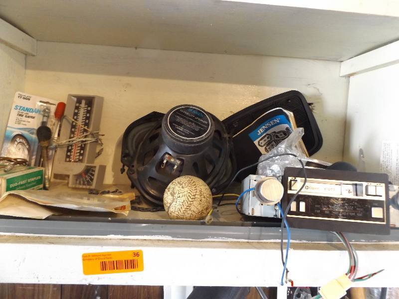 Assorted Misc Items on Bottom Shelf