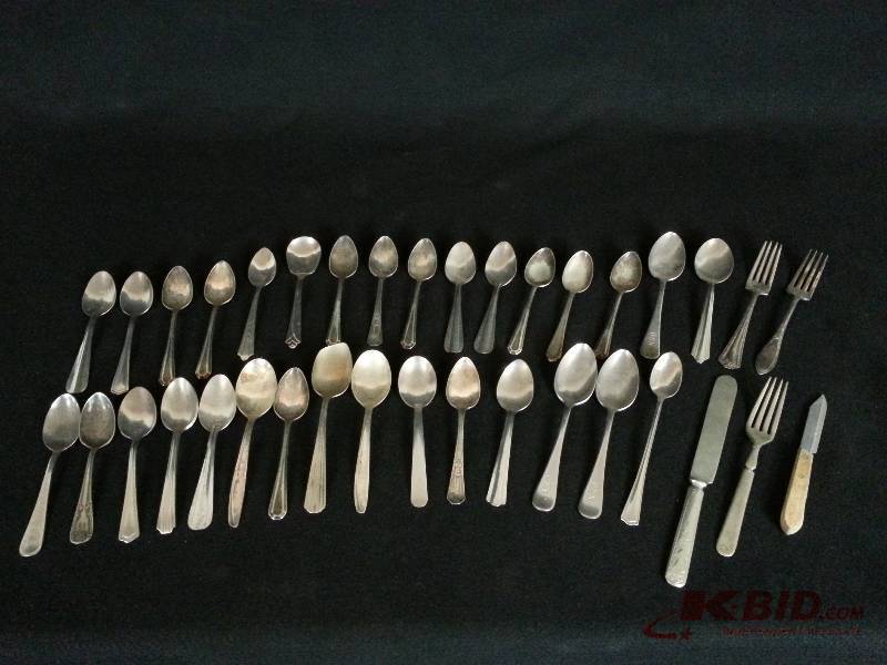 lot 38 image: Lot of (36) Pieces of Flatware, US Navy, Silverplate, Stainless