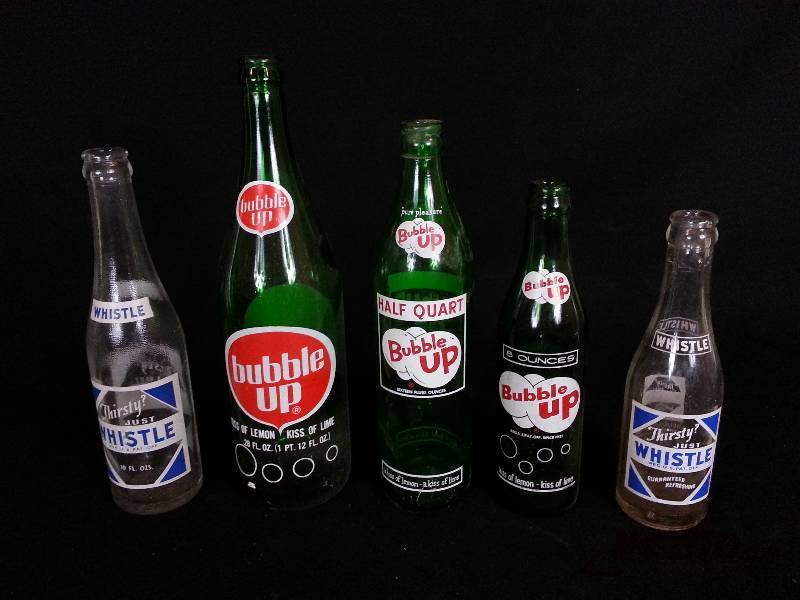 lot 44 image: Lot of (5) Vintage Pop  Cola Bottles - Bubble Up, Whistle