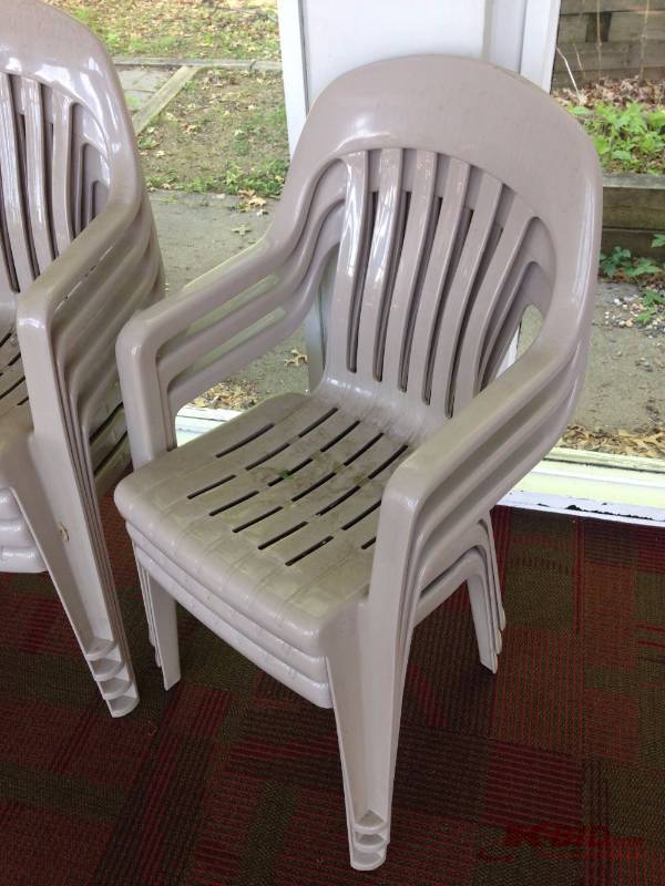 lot 30 image: Lot of (11) plastic outdoor chairs....