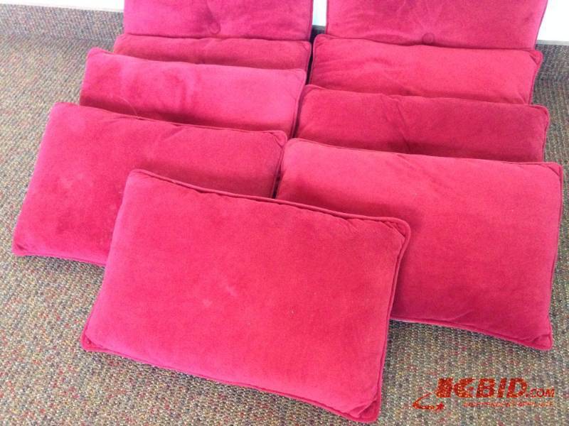 lot 54 image: Lot of (9) red decorative pillows. Measures 2...