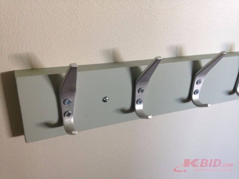 lot 62 image: Pine coat rack painted light gray. Measures 3...