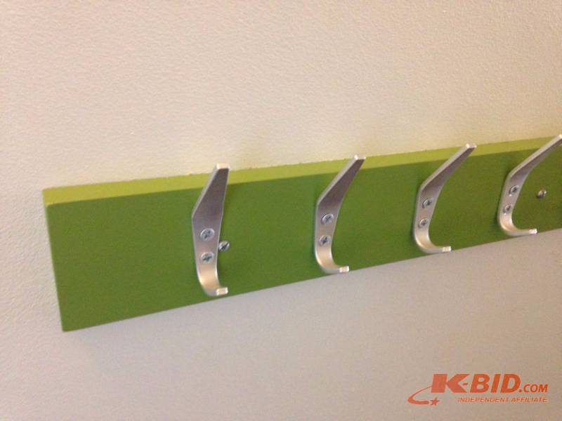 lot 66 image: Pine coat rack painted purple. Measures 32in ...