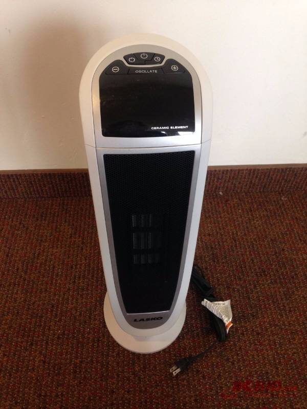 lot 69 image: LASKO floor standing movable air heater. Mode...