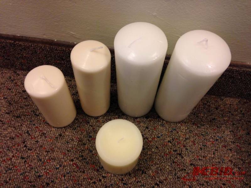 lot 103 image: Lot of brand new candles. Includes 2 7 12in ...
