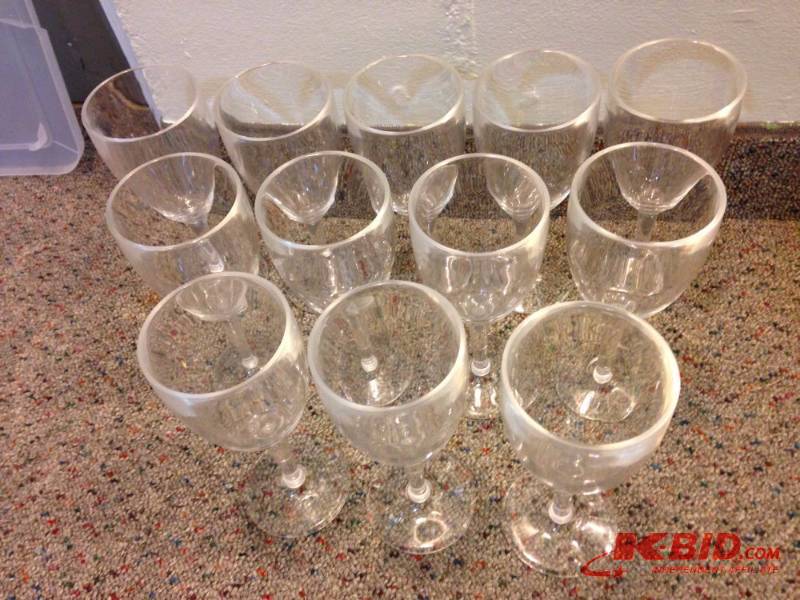 lot 109 image: Lot of (12) plastic wine glasses. 8in tall....