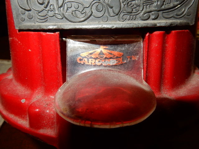 Misc. Vintage items, Gum Ball machine, Cast Iron wall hanings, Circus theme, LIcense plates, paper cutter