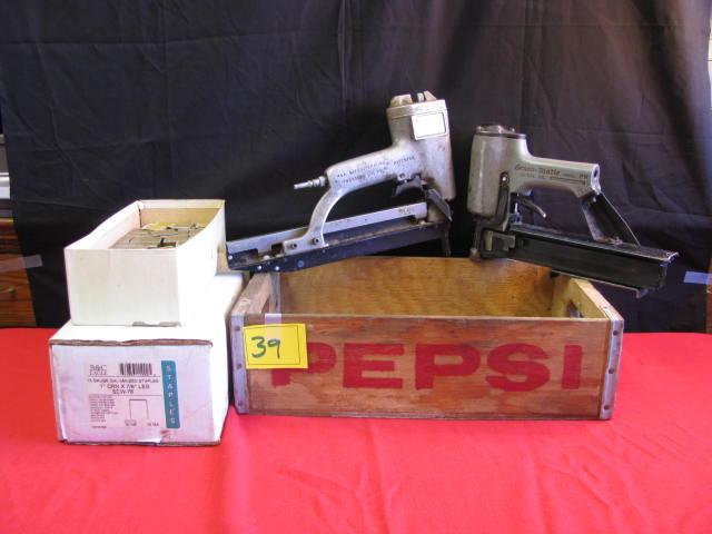 Pepsi crate and two power staplers and staples