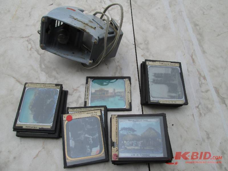 lot 6 image: Slide projector with vintage slides...