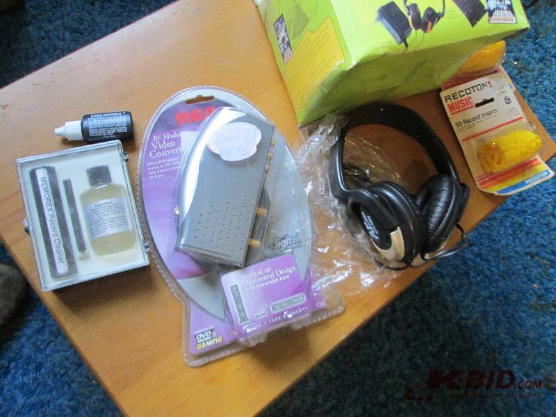 lot 79 image: Headphones, record inserts, record ...