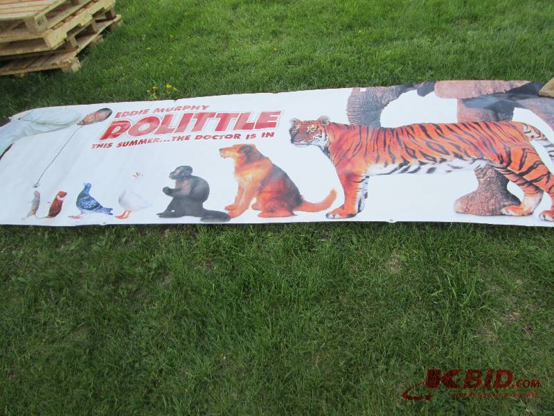 lot 103 image: 47 x 166 inch Dolittle movie poster...