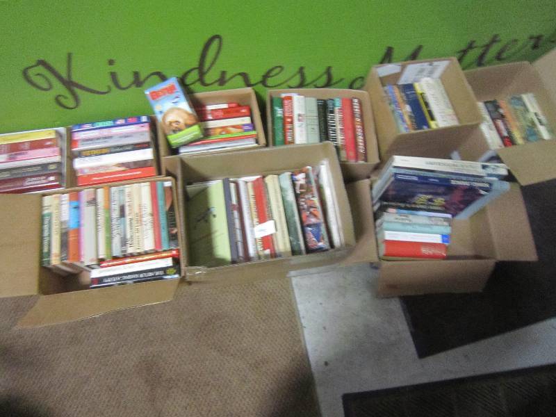 9 BOXES OF BOOKS.