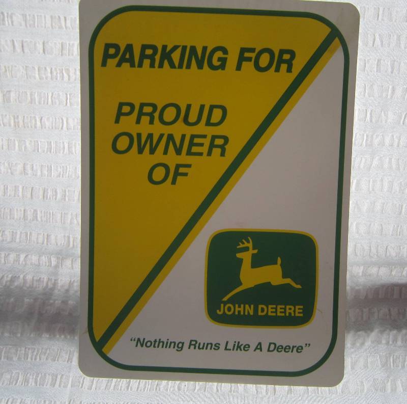 Parking for Proud owner of John Deere sign