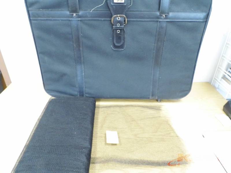 lot 29 image: Black Tulle wSuitcse