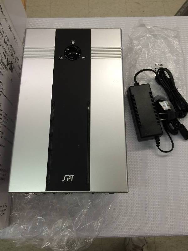lot 1 image: mini dehumidifier with uv light