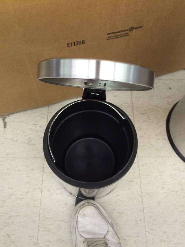 lot 79 image: two garbage cans