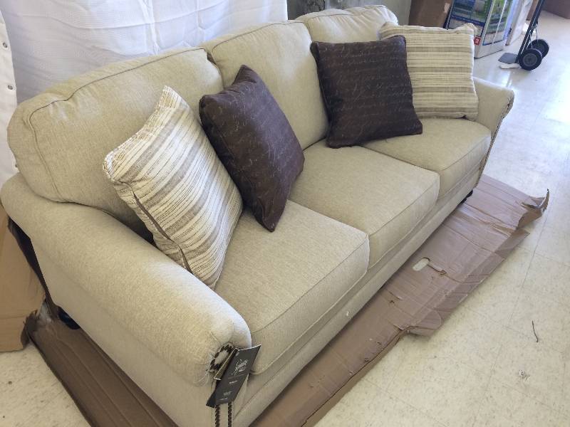 lot 111 image: Ashley 1300038 Milari Sofa with Rolled Arms Adorned with Nail-Head retail $499