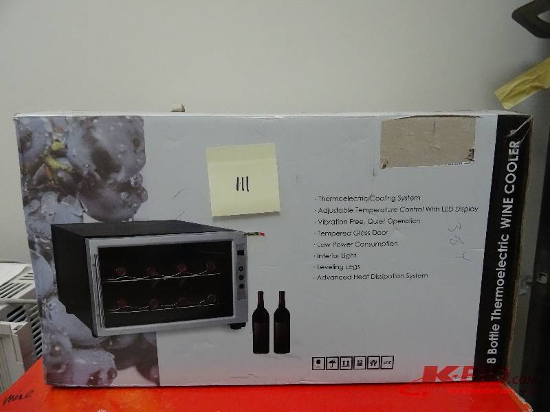 8 bottle thermo electric wine cooler.