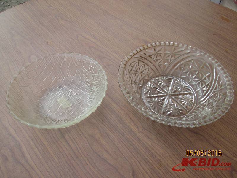 Pair of clear glass serving bowls. ...