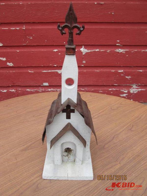 Very nice chapel shaped bird house...