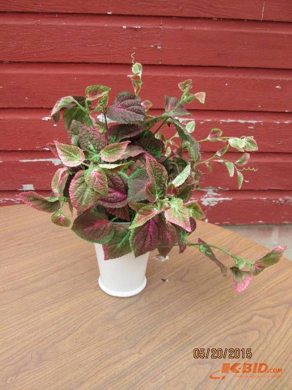 Single artificial potted plant...