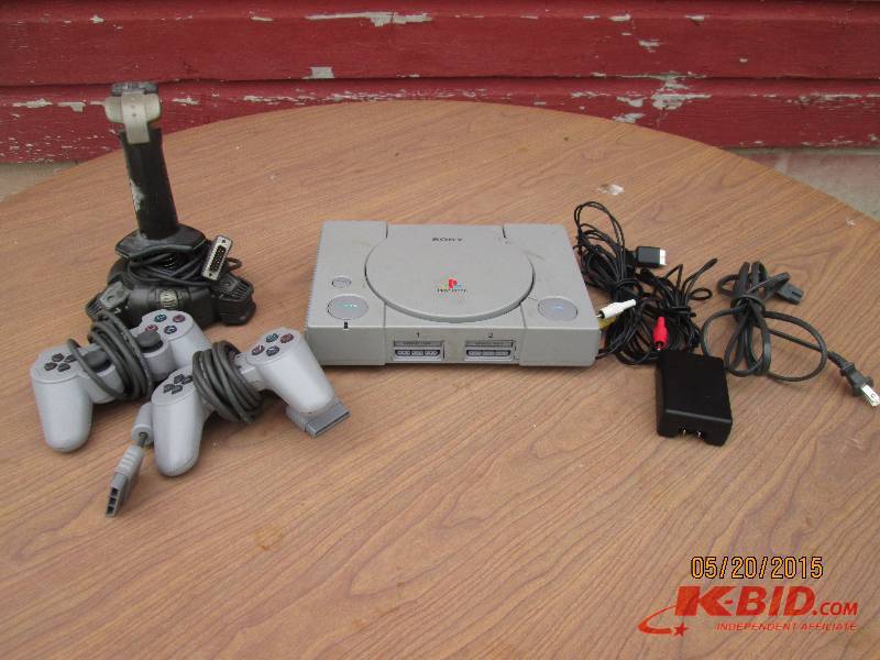 Sony Playstation. Includes 2 handhe...