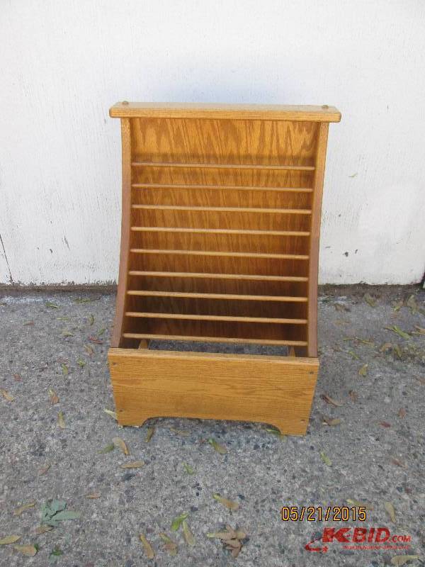Tall wooden magazine rack. Measures...