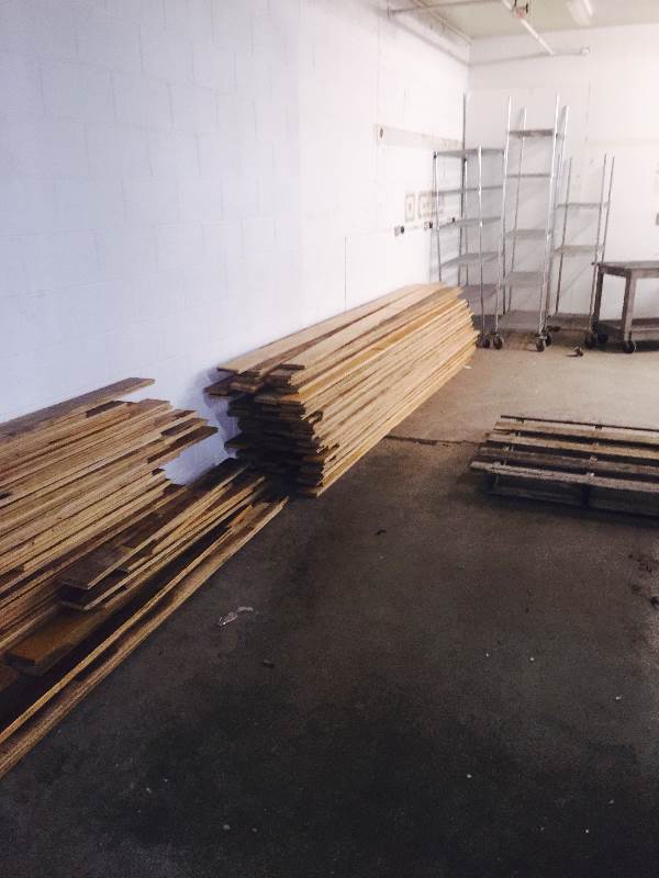 Beach Wood Tongue and Groove Flooring.  Approx 700 SF.  Origanally a Gym Floor