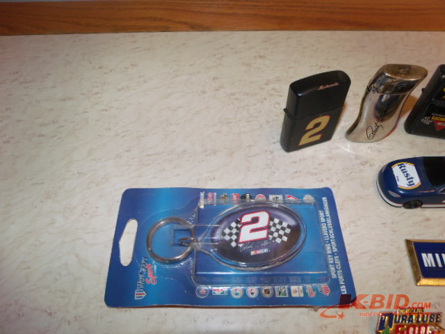 Lot of various Rusty Wallace cigarette lighters and lighter covers and keychains.
