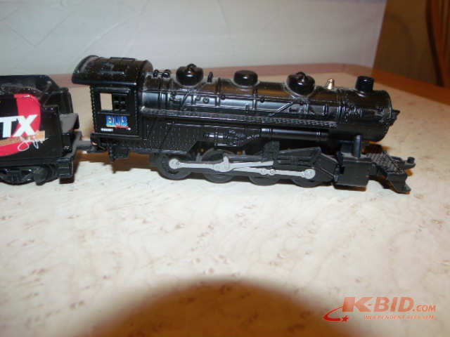 Diecast train with 164 scale Rusty Wallace car and a John Force Funny Car.