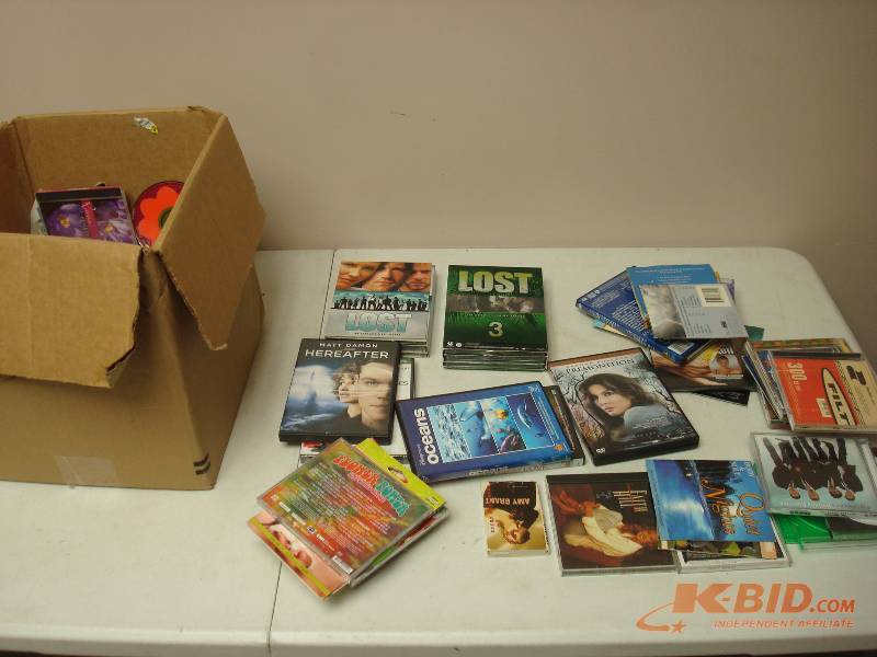 lot 25 image: Lot Of Mixed DVDs And CDs, Some May Show Wear, Scratches