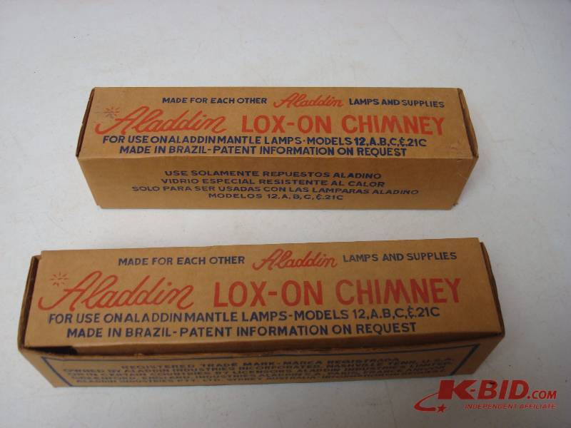 lot 33 image: Pair Of New Aladdin Lantern Chimney Glass