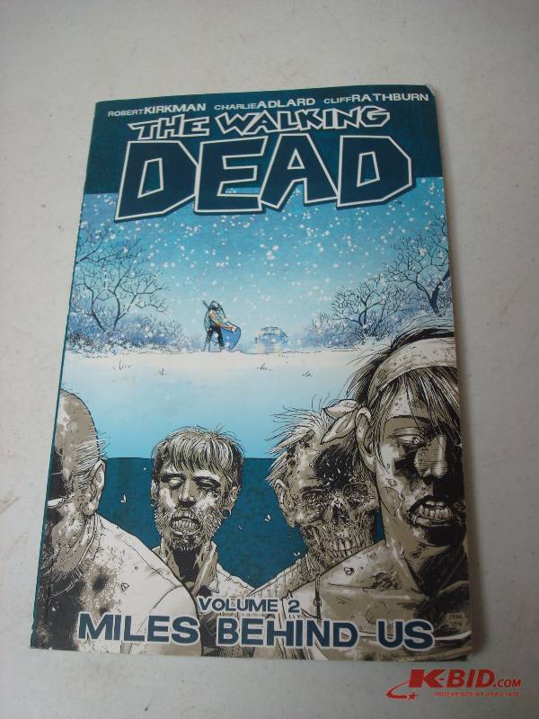 lot 53 image: Walking Dead Graphic Novel Comics - Vol 2 Miles Behind Us- Some Wear