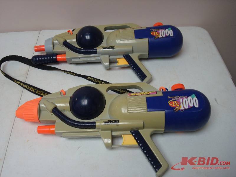 lot 122 image: Pair of Super Soakers, Broke For Parts, Sold As Is