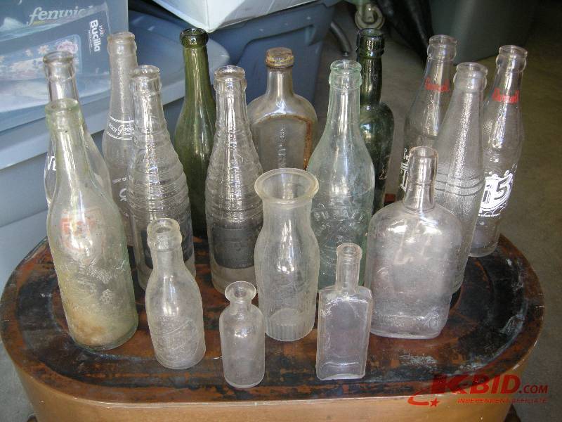 lot 34 image: Old bottlespop bottles