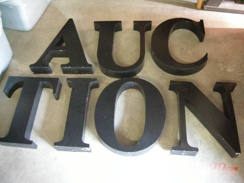 lot 90 image: A.U.C.T.I.O.N block letters