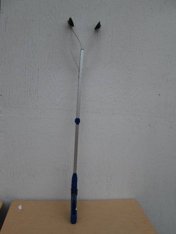Reach tool with suction cup ends...