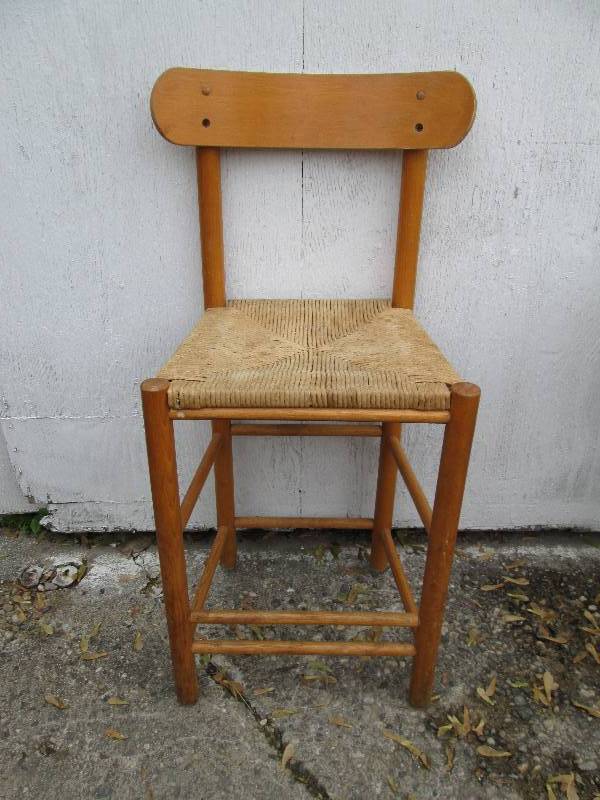 Vintage wood chair with woven seat...