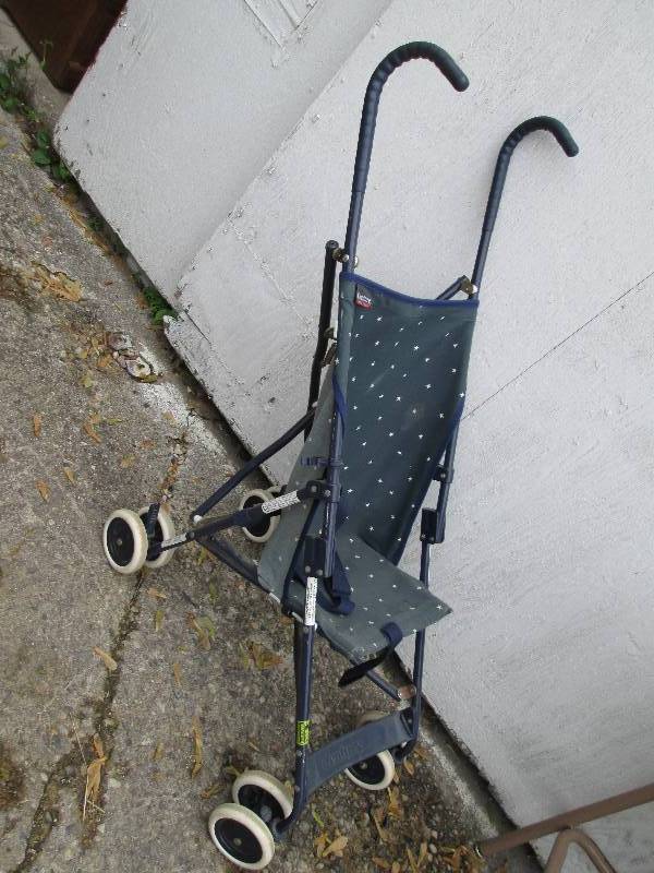 Century folding stroller...